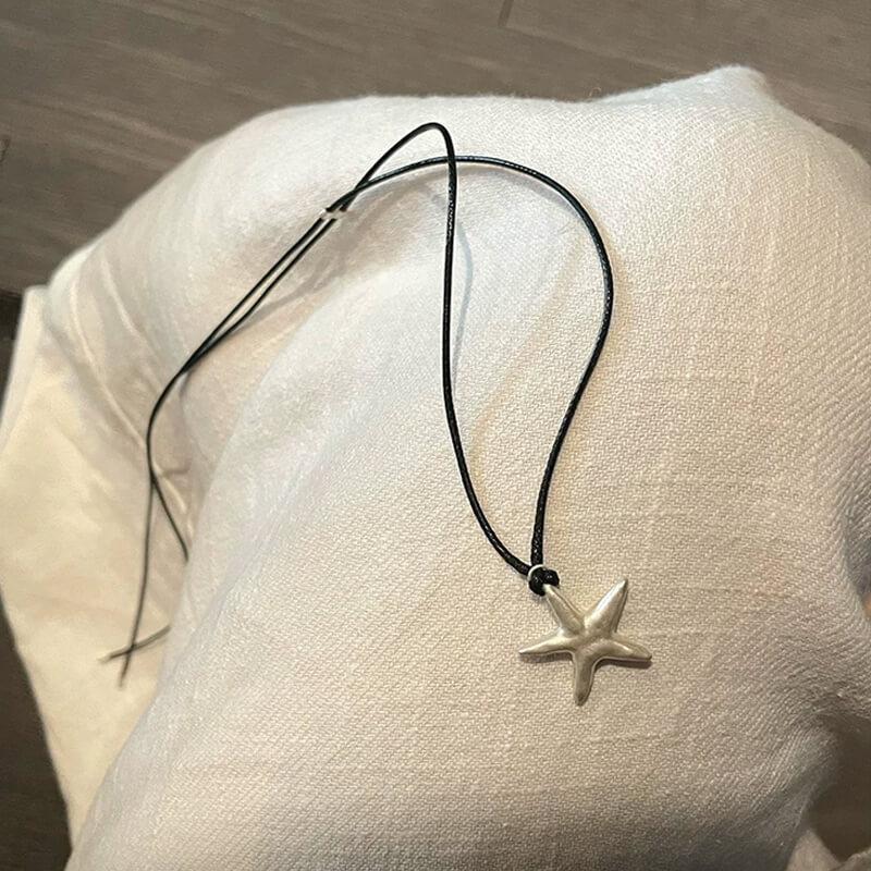 Original S990 Silver Starfish Necklace – Handmade Sandblasted Matte Finish with Black Cord — A minimalist starfish pendant in hand-sandblasted S990 silver,